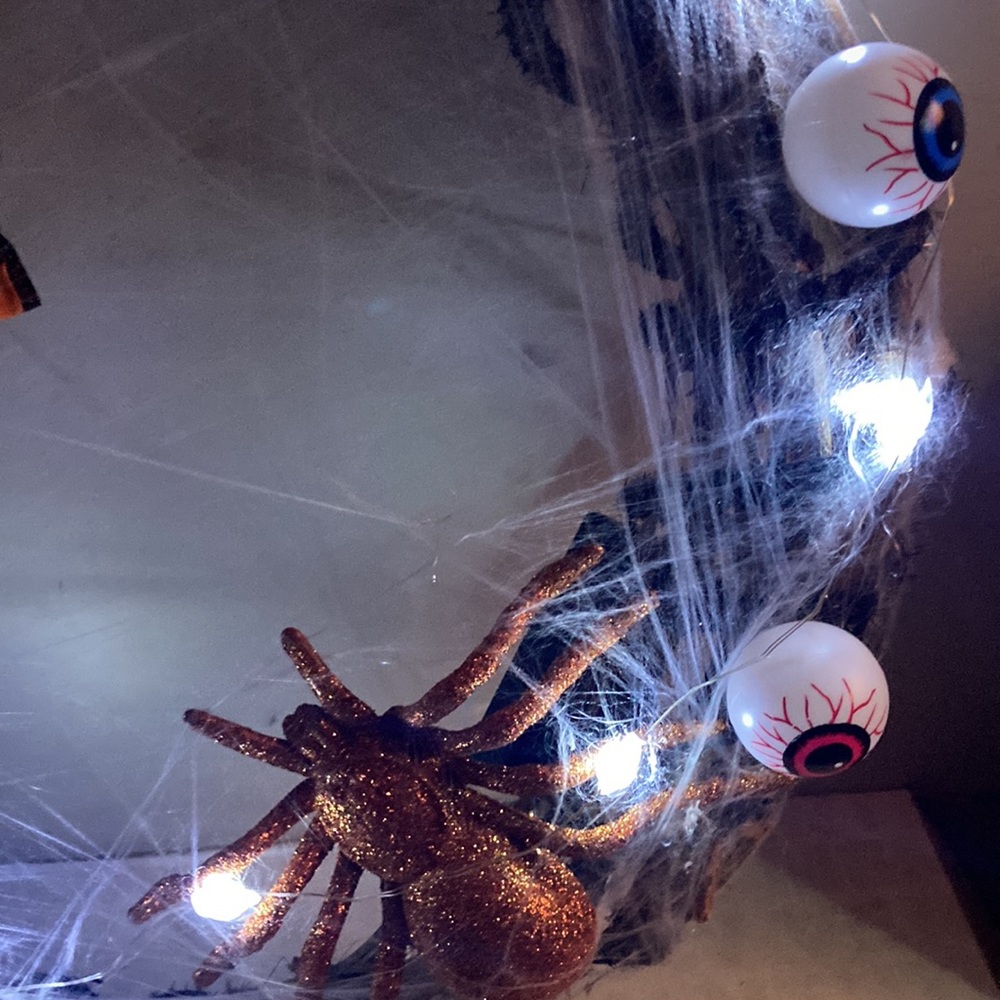 Very cool, spooky and very much halloween handmade wreath.